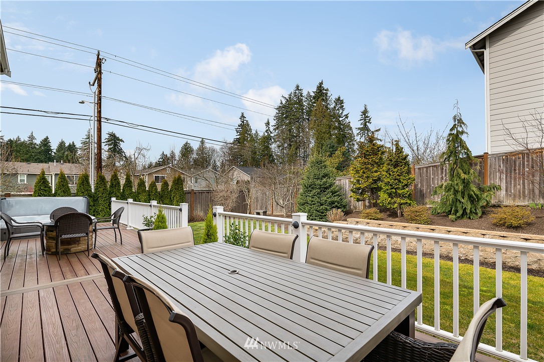 3909 219th Street Southeast Bothell, WA 98021 - Photo 31 of 34 a view of a deck with wooden floor and outdoor seating