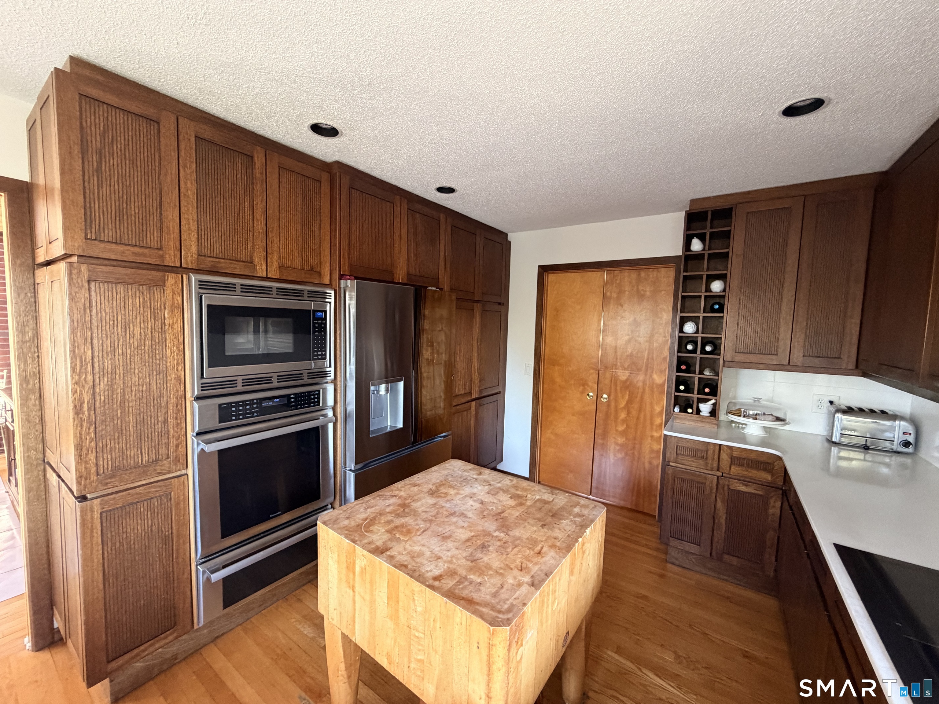 86 Washburn Road Canton, CT 06019 - Photo 5 of 40 a kitchen with stainless steel appliances granite countertop a refrigerator stove and sink