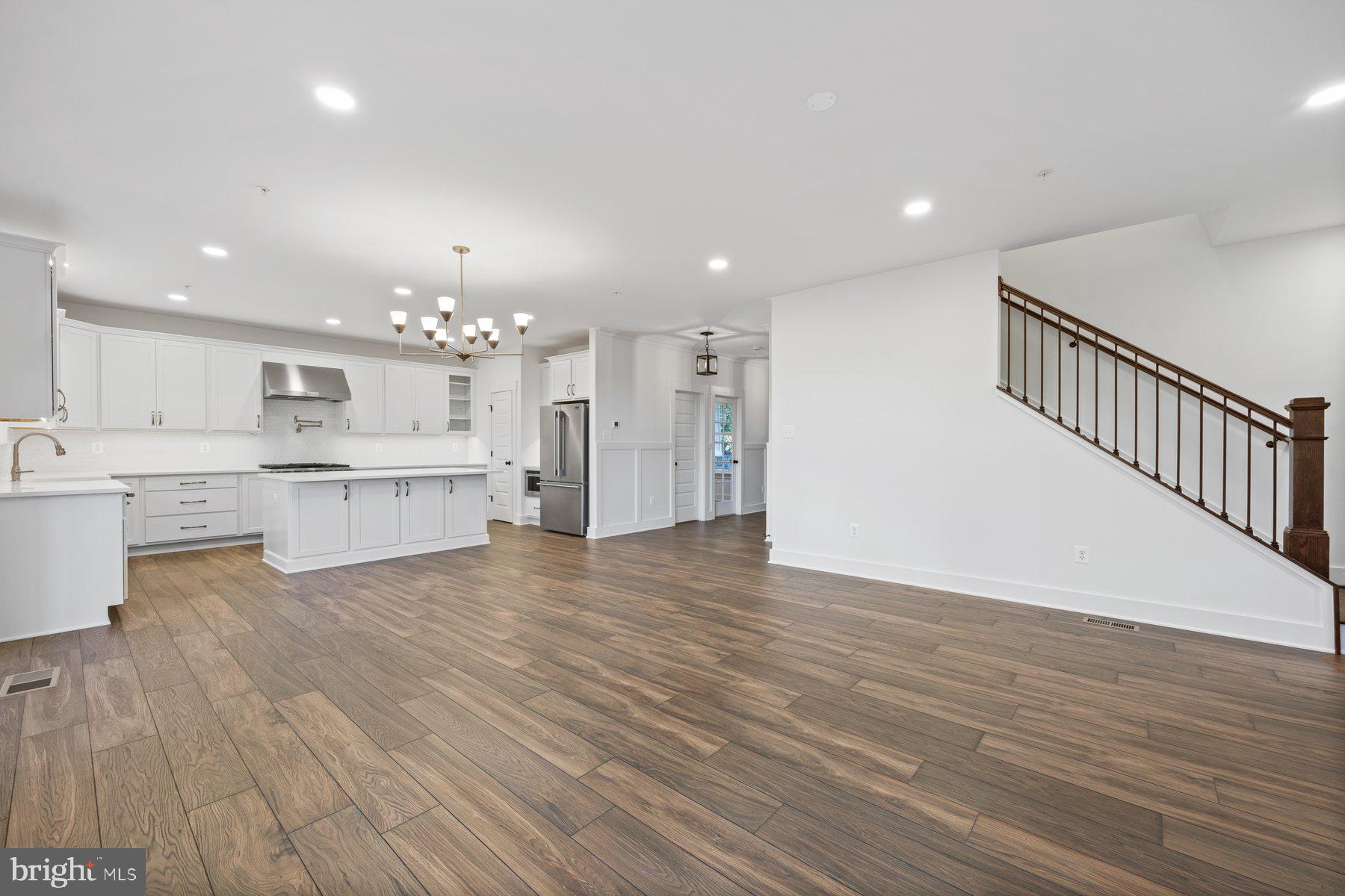 6720 Oakridge Road New Market, MD 21774 - Photo 19 of 41 Family room leads upstairs.