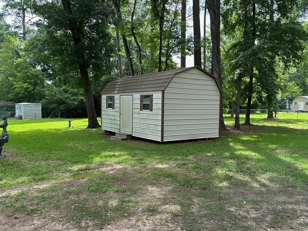 6371 Buncombe Road Shreveport, LA 71129 - Photo 5 of 17 a view of a backyard with a garden