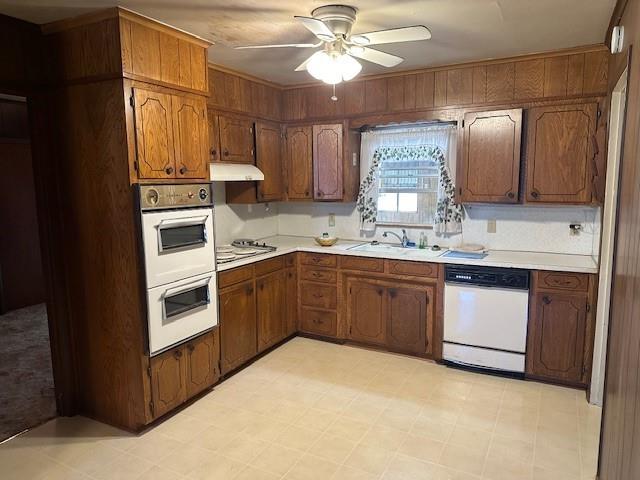 6371 Buncombe Road Shreveport, LA 71129 - Photo 10 of 17 a kitchen with stainless steel appliances granite countertop a stove a sink and a microwave