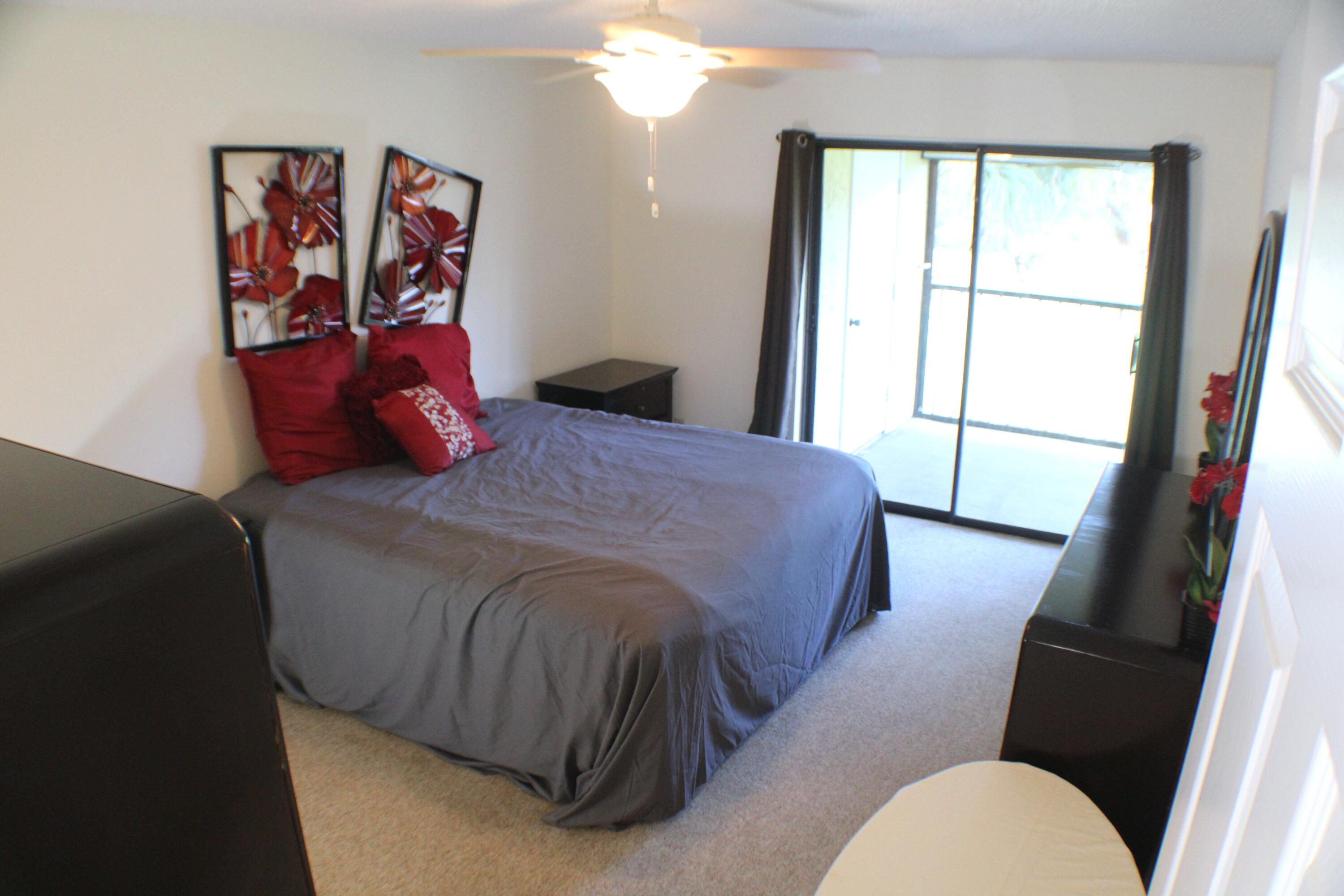 1082 Keystone Drive, Unit C Jupiter, FL 33458 - Photo 10 of 26 Primary suite