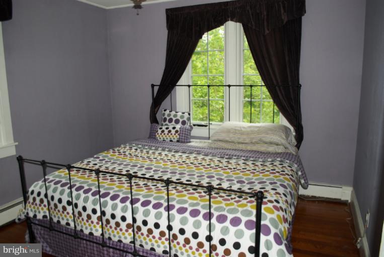 8049 Long Hill Road Pasadena, MD 21122 - Photo 17 of 28 Master Bedroom