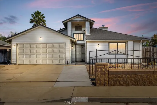 a view of a house with a garage