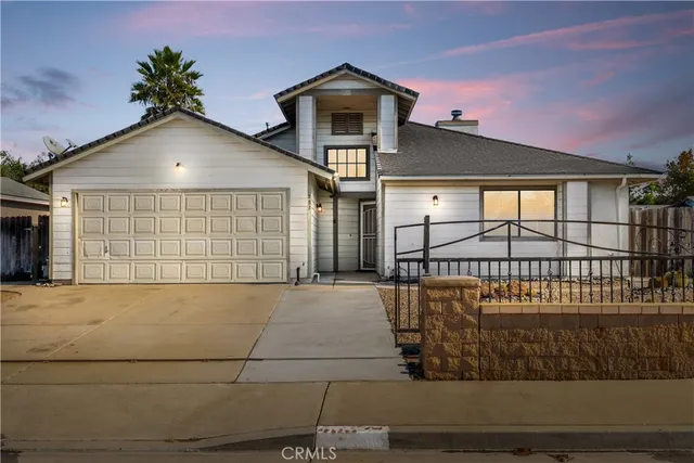 a view of a house with a garage
