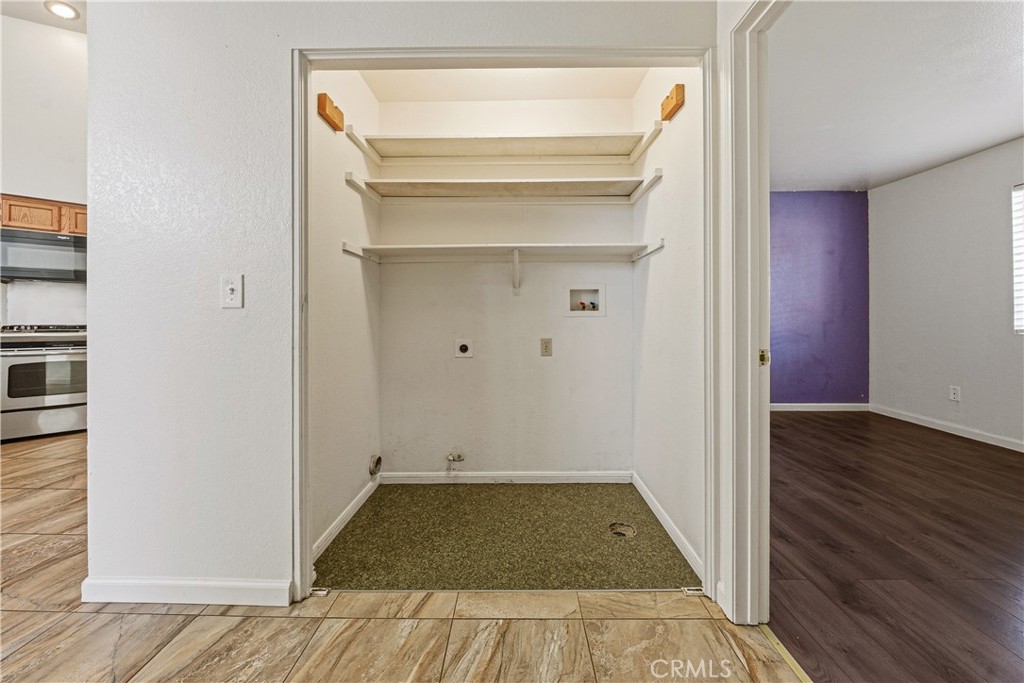 483 Violet Avenue Nipomo, CA 93444 - Photo 23 of 47 a view of a room with wooden floor and closet