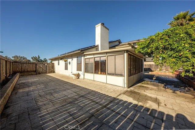 a front view of a house with patio