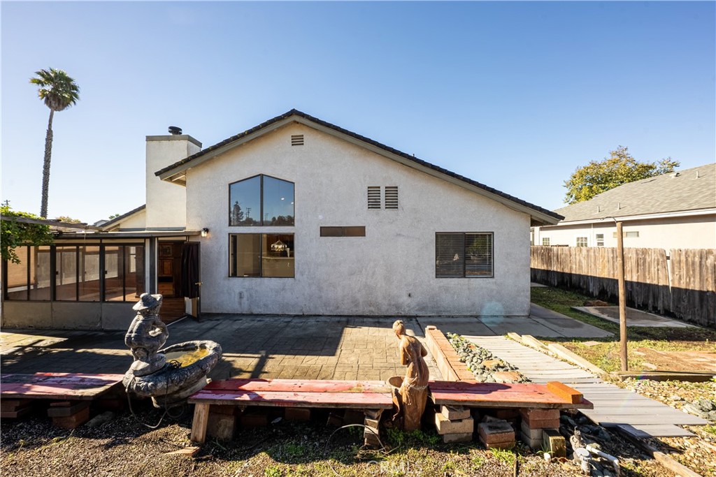 483 Violet Avenue Nipomo, CA 93444 - Photo 36 of 47 a backyard of a house with yard fire pit and outdoor seating