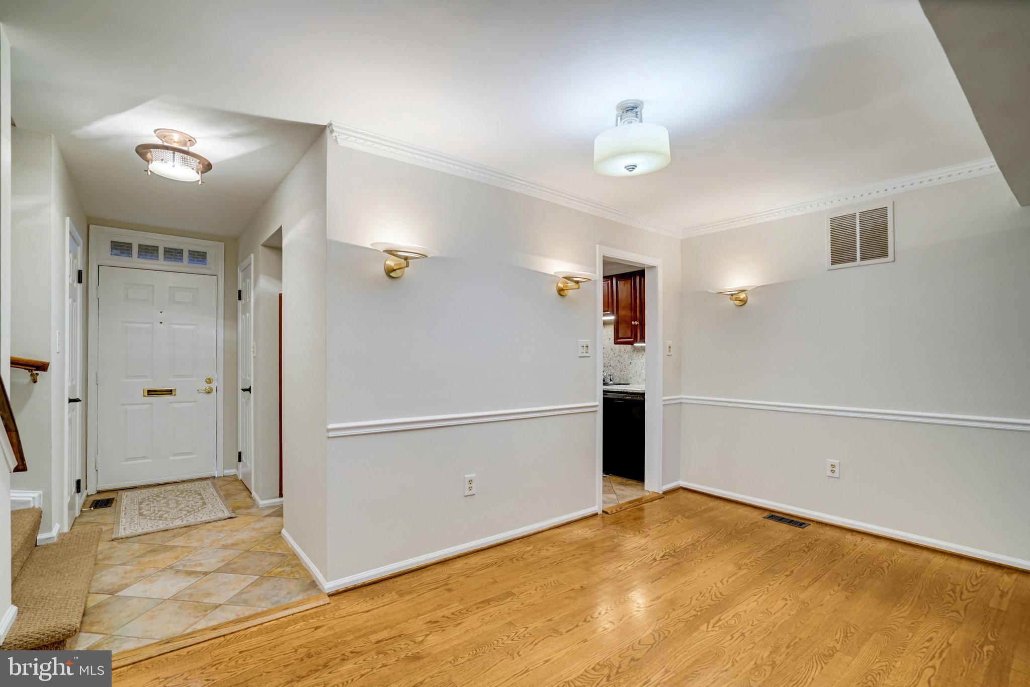 2540 South Walter Reed Drive, Unit 4 Arlington, VA 22206 - Photo 12 of 40 a view of a livingroom with an empty space