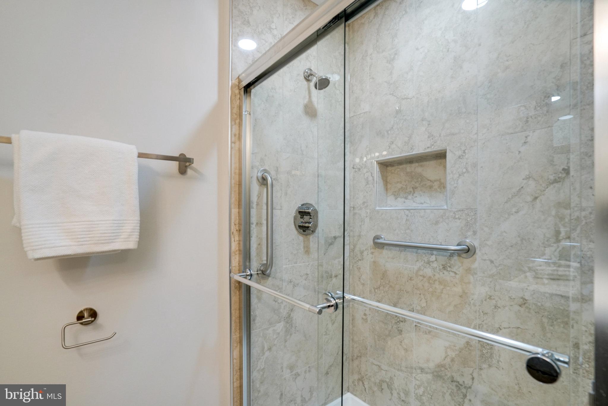 2540 South Walter Reed Drive, Unit 4 Arlington, VA 22206 - Photo 34 of 40 a bathroom with a shower