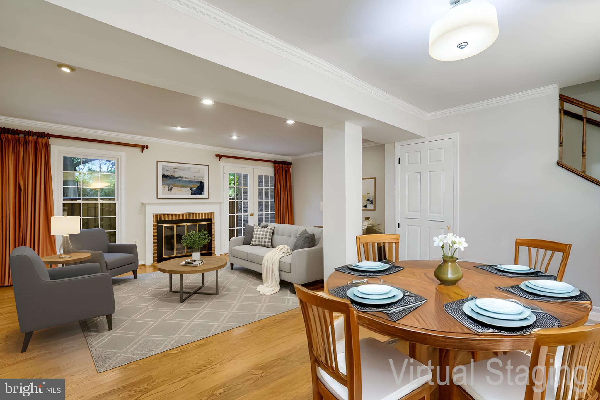 2540 South Walter Reed Drive, Unit 4 Arlington, VA 22206 - Photo 10 of 40 a living room with furniture and a fireplace