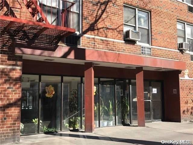 41-07 Bowne Street, Unit 3K Queens, NY 11355 - Photo 15 of 17 front view of a building
