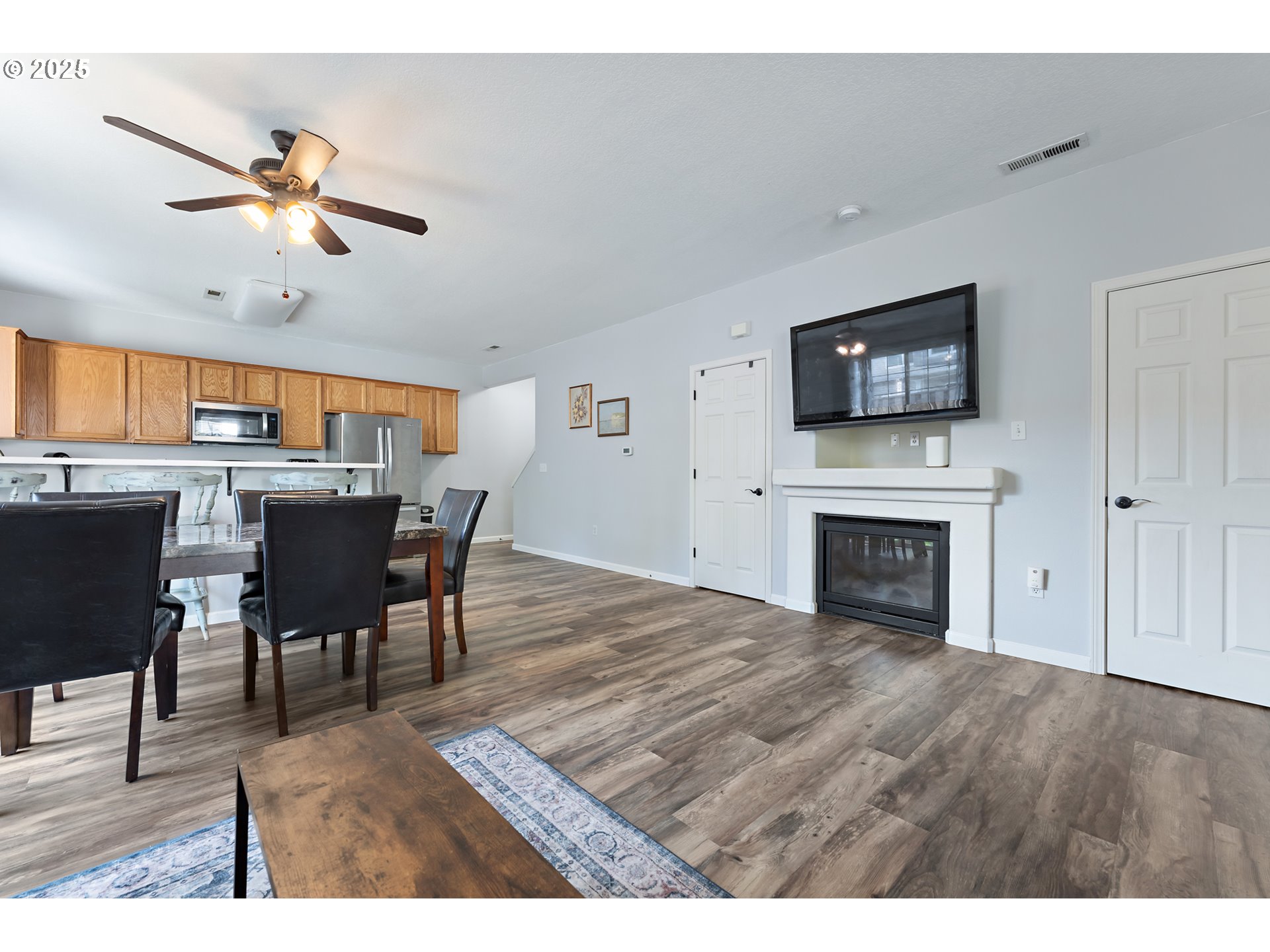 6255 Southwest 182nd Terrace Beaverton, OR 97007 - Photo 12 of 42 a view of a livingroom with furniture and a fireplace