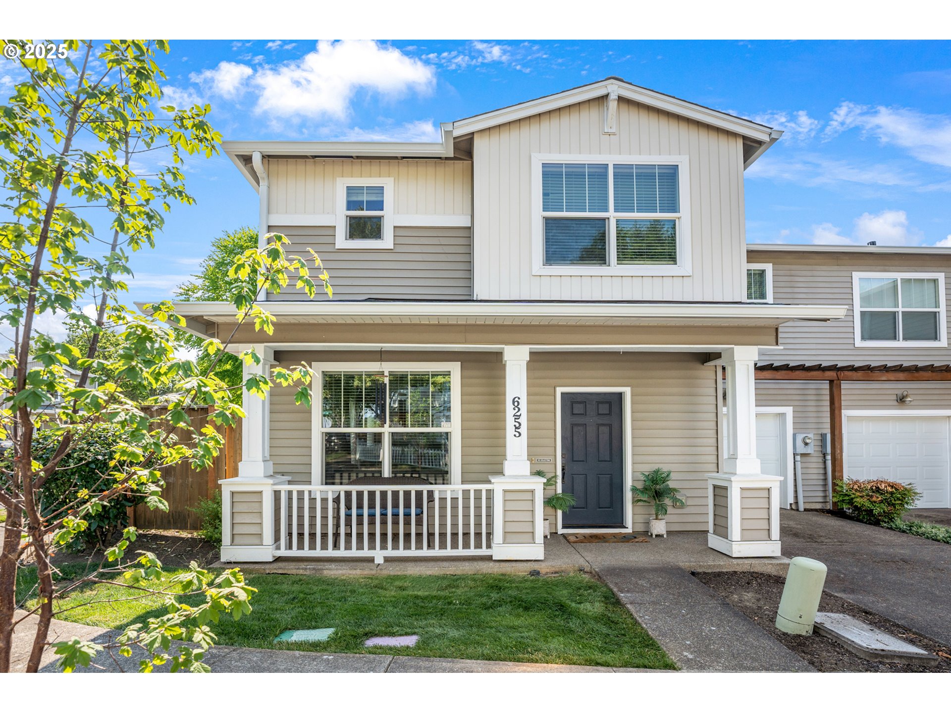 6255 Southwest 182nd Terrace Beaverton, OR 97007 - Photo 2 of 42 a view of a house with a yard and plants