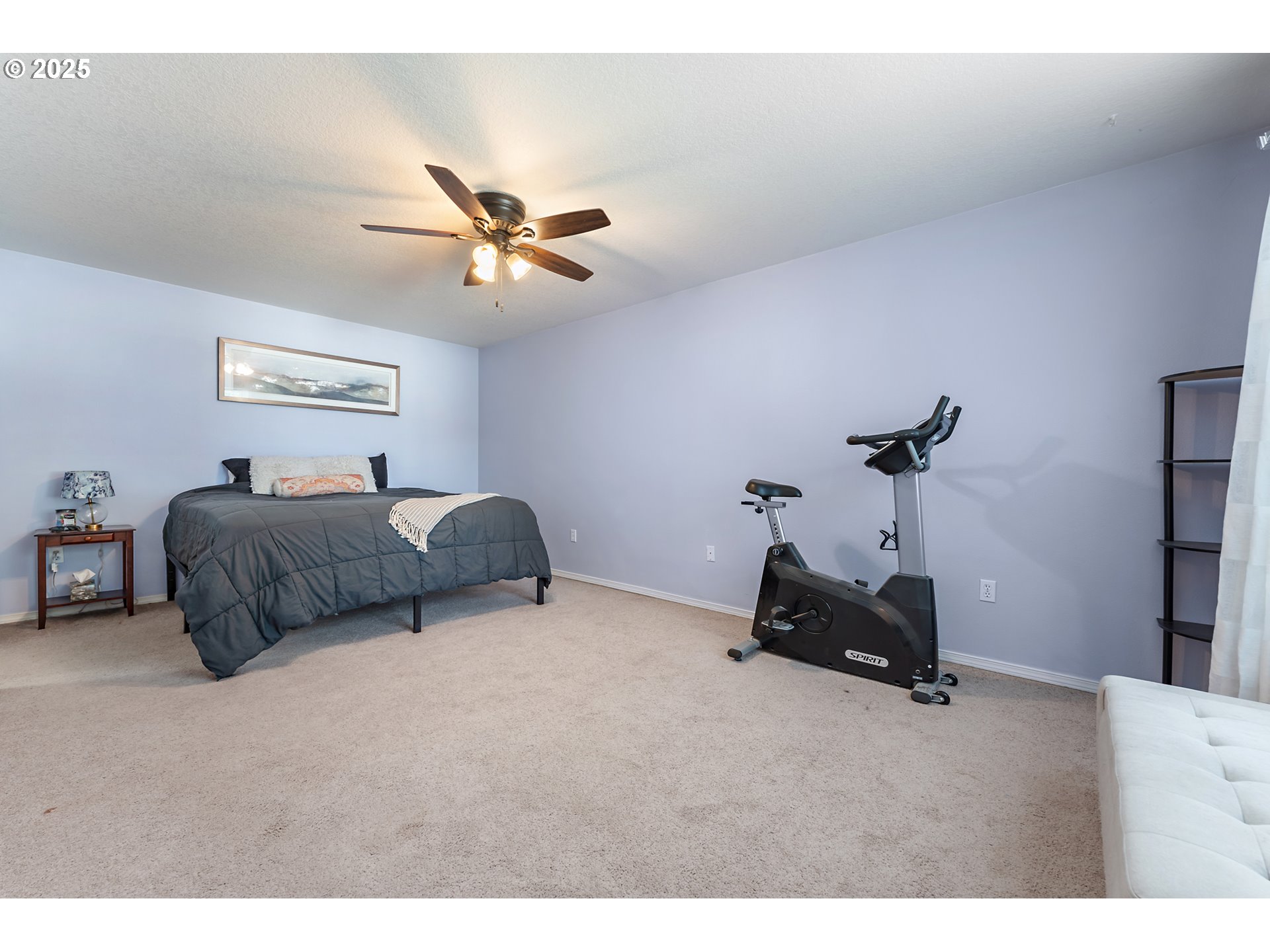 6255 Southwest 182nd Terrace Beaverton, OR 97007 - Photo 24 of 42 a bedroom with furniture and a ceiling fan