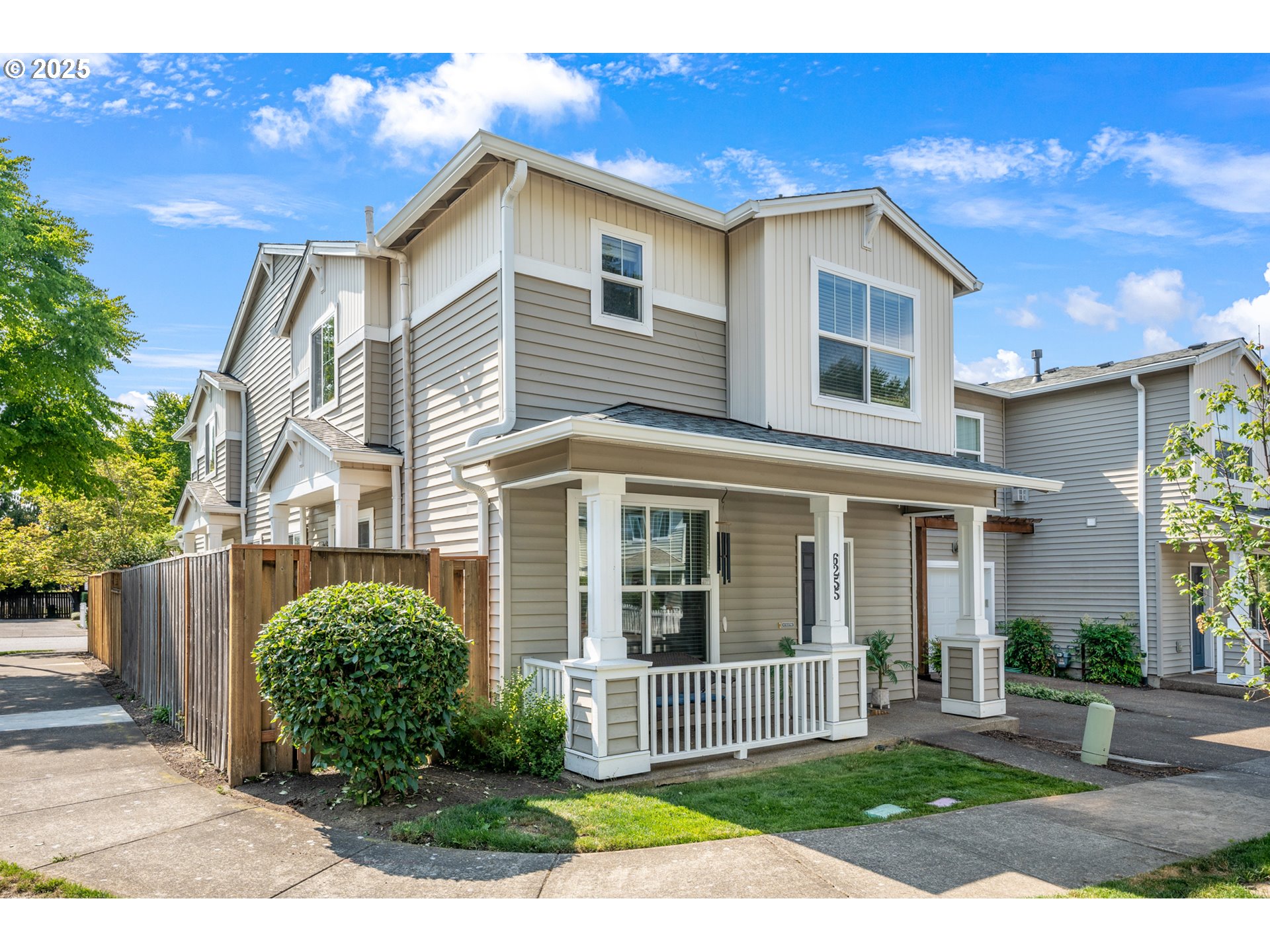 6255 Southwest 182nd Terrace Beaverton, OR 97007 - Photo 3 of 42 a front view of a house with a yard