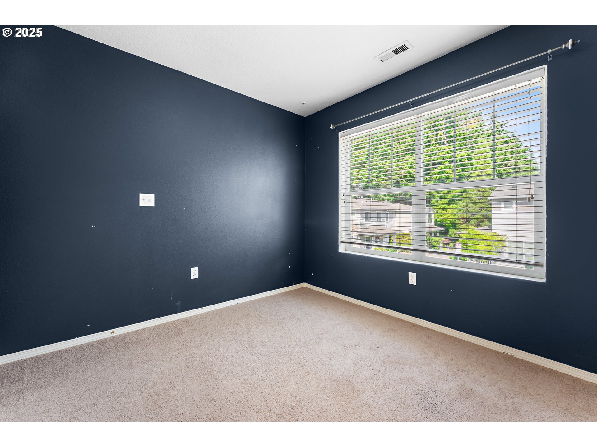 6255 Southwest 182nd Terrace Beaverton, OR 97007 - Photo 31 of 42 a view of an empty room with a window