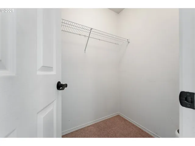 a bathroom with a sink toilet a mirror and shower curtain