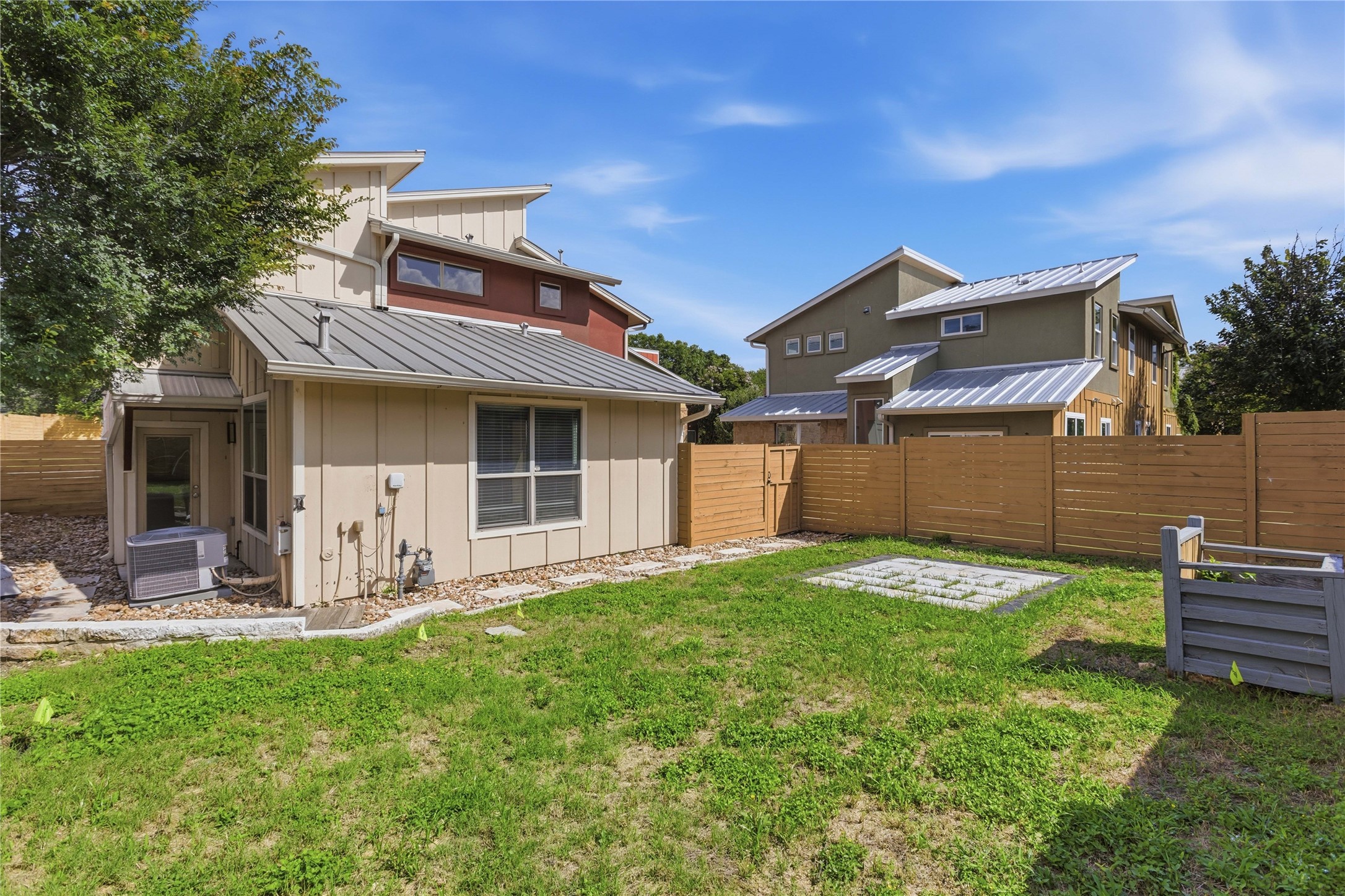 4124 Valley View Road, Unit 4A & 4B Austin, TX 78704 - Photo 32 of 40 A fenced backyard offers a private outdoor sanctuary, perfect for relaxation and recreation.