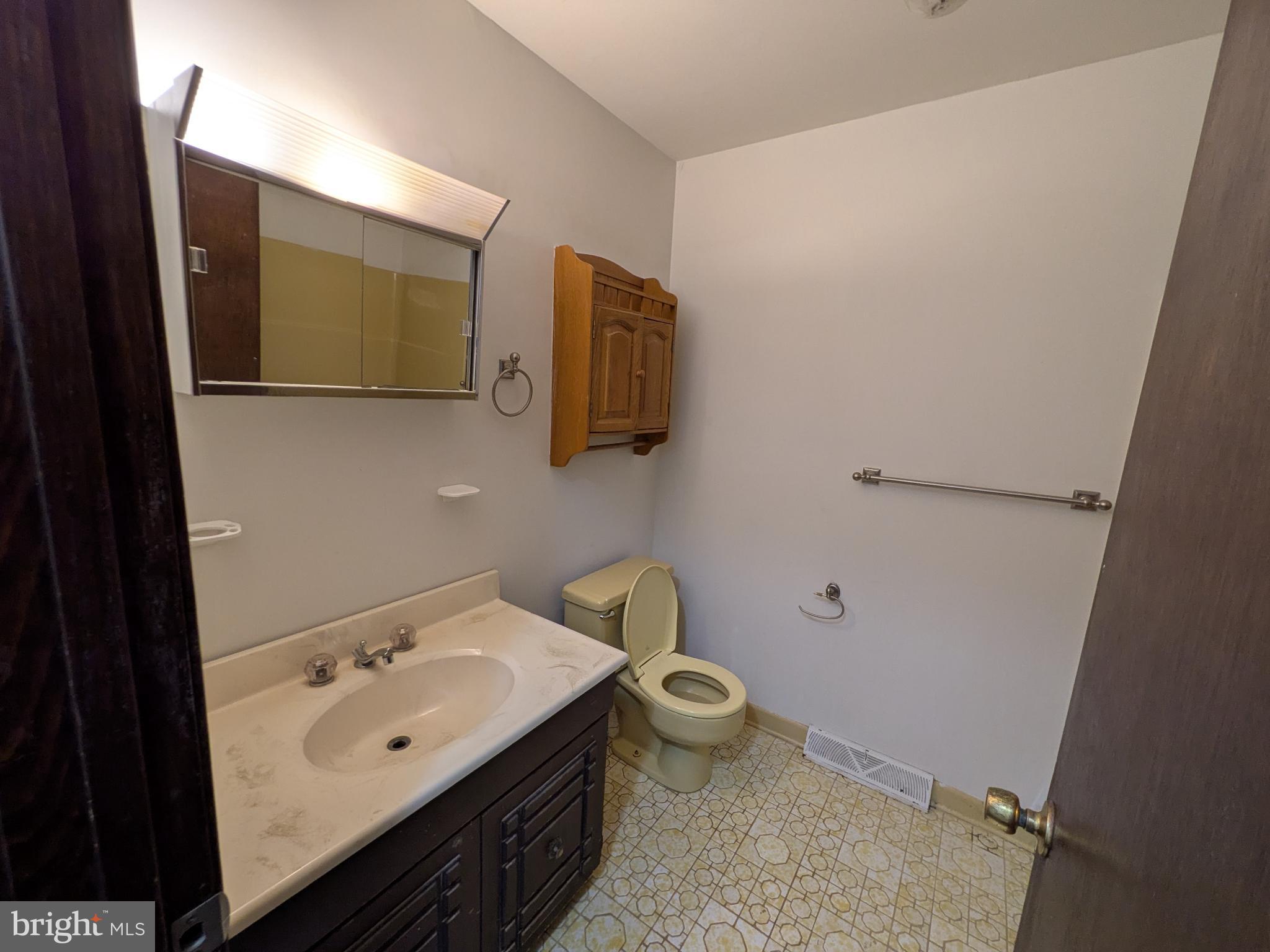9511 Rogues Road Midland, VA 22728 - Photo 12 of 34 Charming bathroom with classic fixtures.