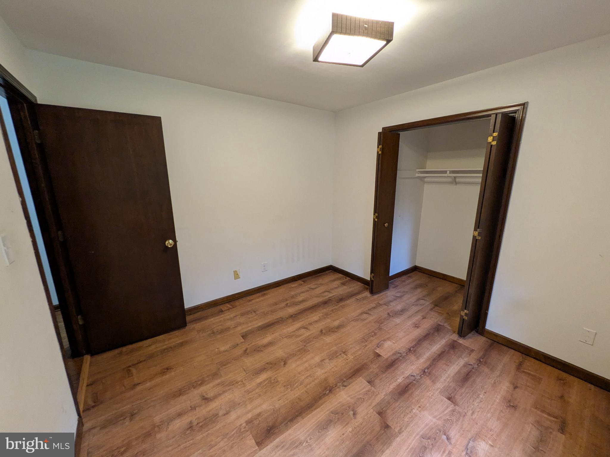 9511 Rogues Road Midland, VA 22728 - Photo 20 of 34 Cozy room with warm wood flooring.