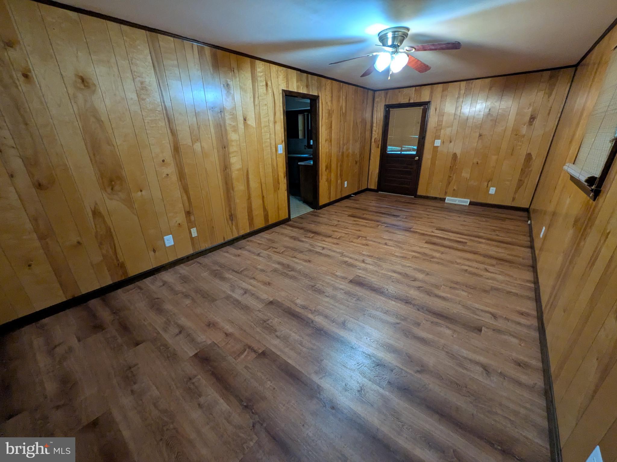 9511 Rogues Road Midland, VA 22728 - Photo 31 of 34 Spacious room with warm wooden accents.