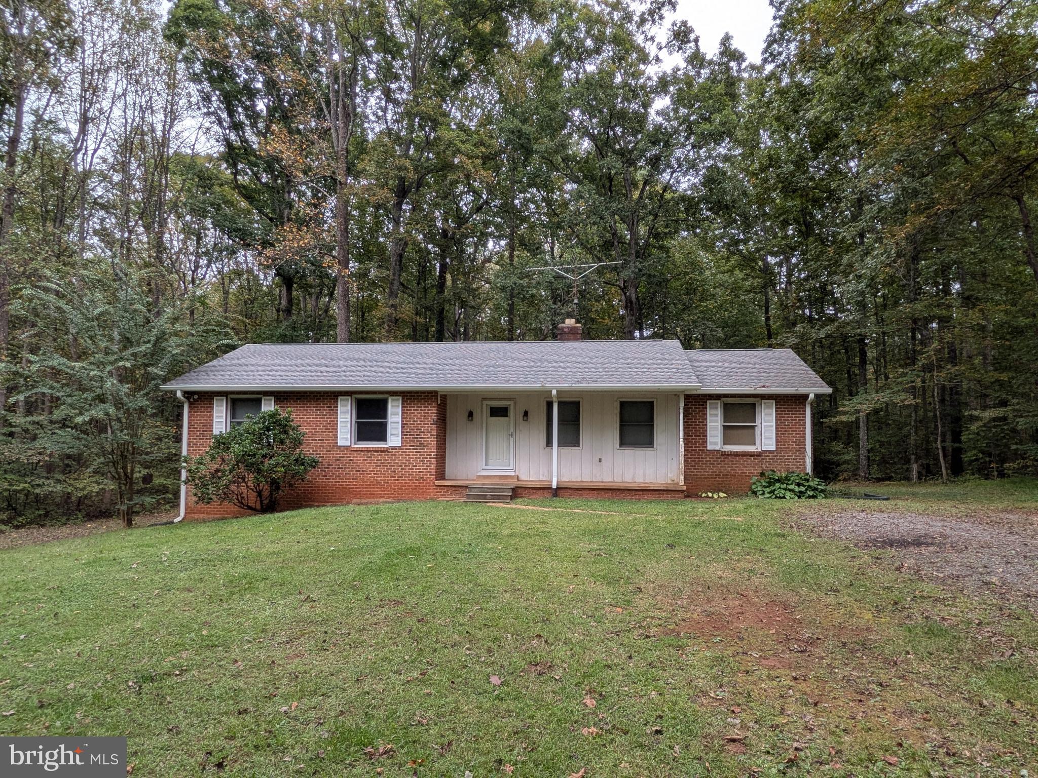 9511 Rogues Road Midland, VA 22728 - Photo 4 of 34 Charming brick home nestled in serene woods.