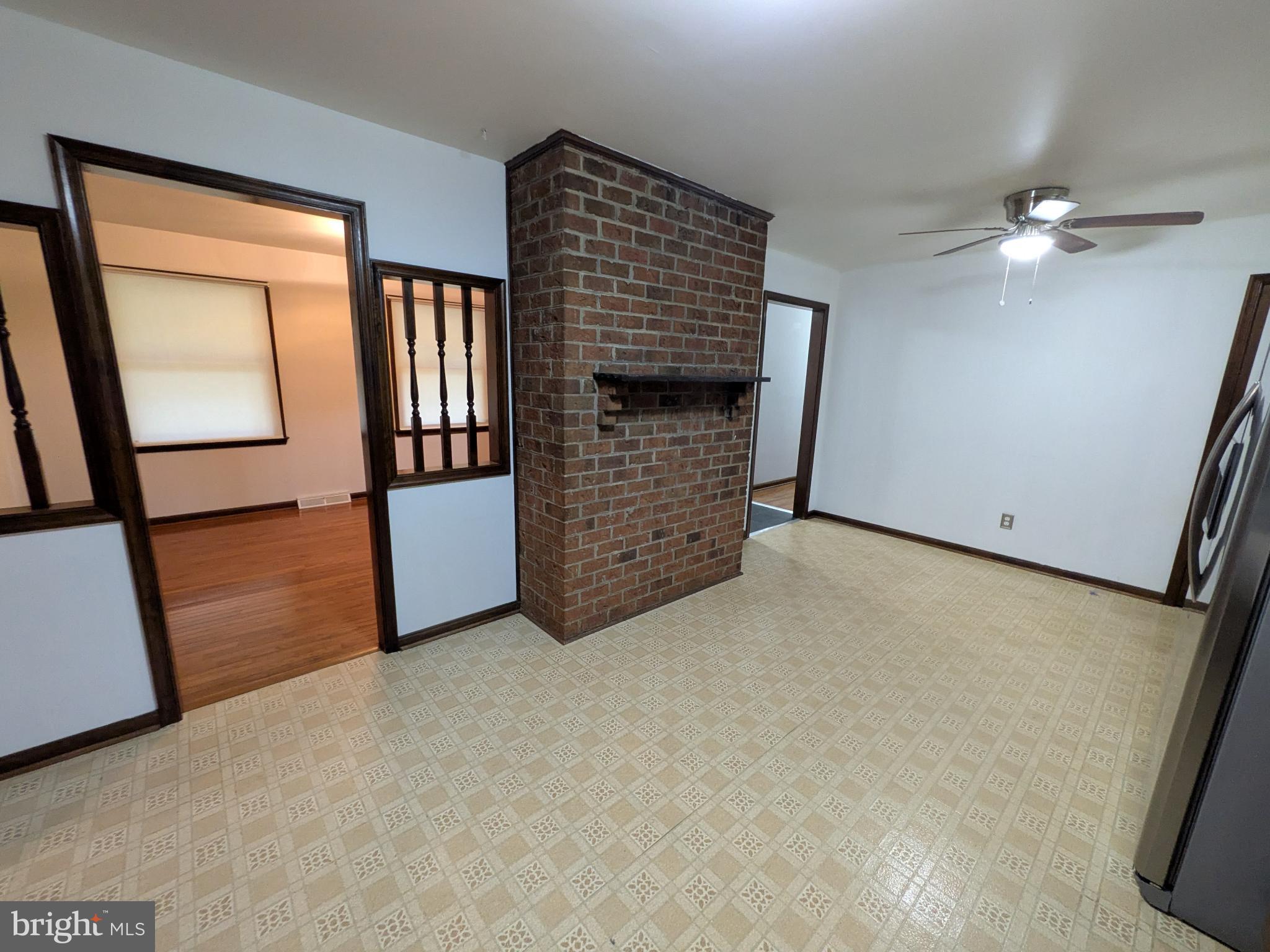 9511 Rogues Road Midland, VA 22728 - Photo 10 of 34 Spacious living area with charming brick accents.