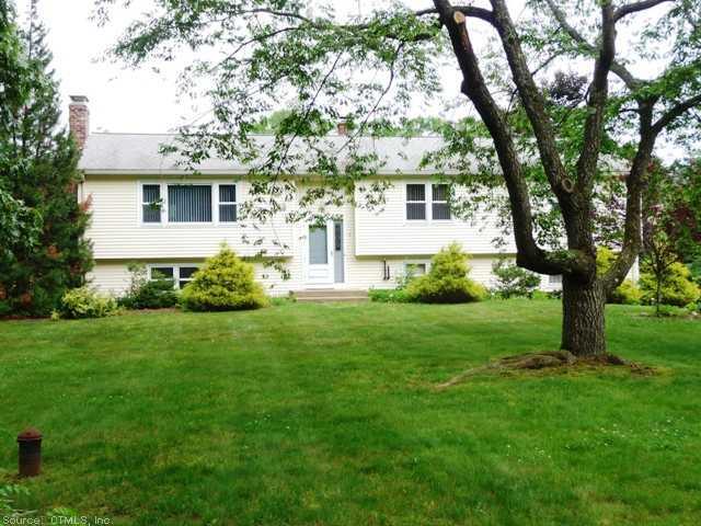 8 Rose Haven Road Somers, CT 06071 - Photo 1 of 1 a front view of house with yard and green space
