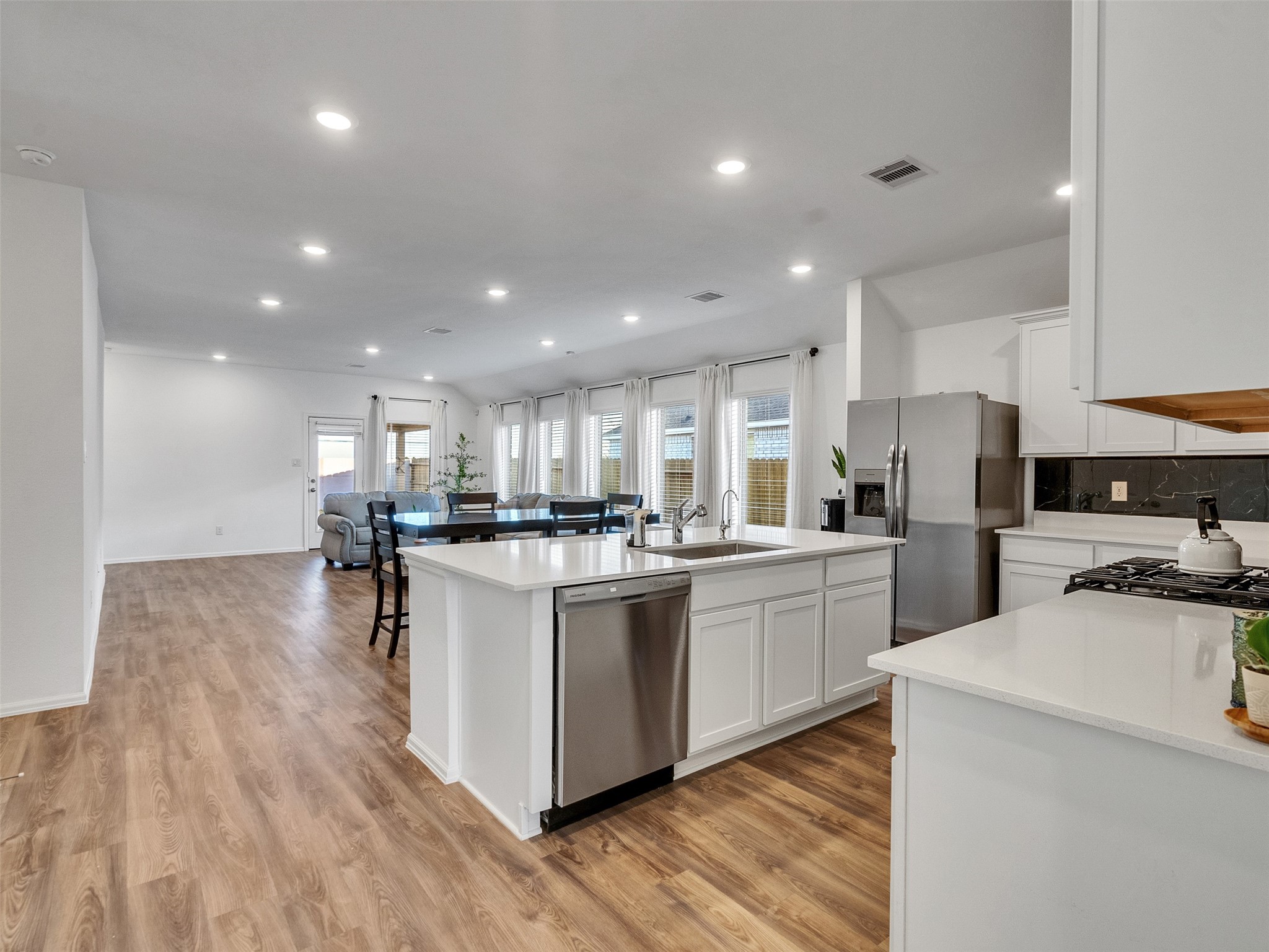 3019 Live Spgs Way Rosenberg, TX 77471 - Photo 11 of 36 a kitchen with refrigerator and cabinets