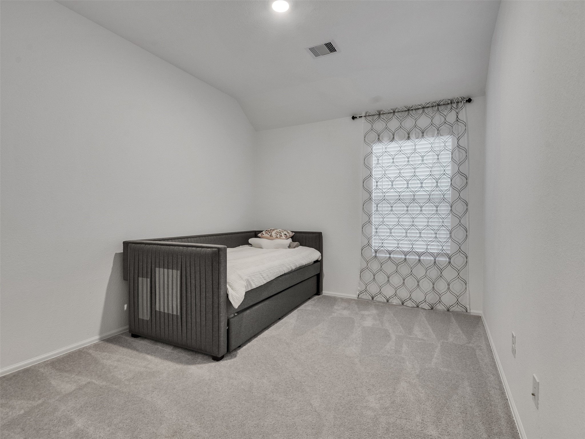 3019 Live Spgs Way Rosenberg, TX 77471 - Photo 19 of 36 a spacious bedroom with a bed and a window