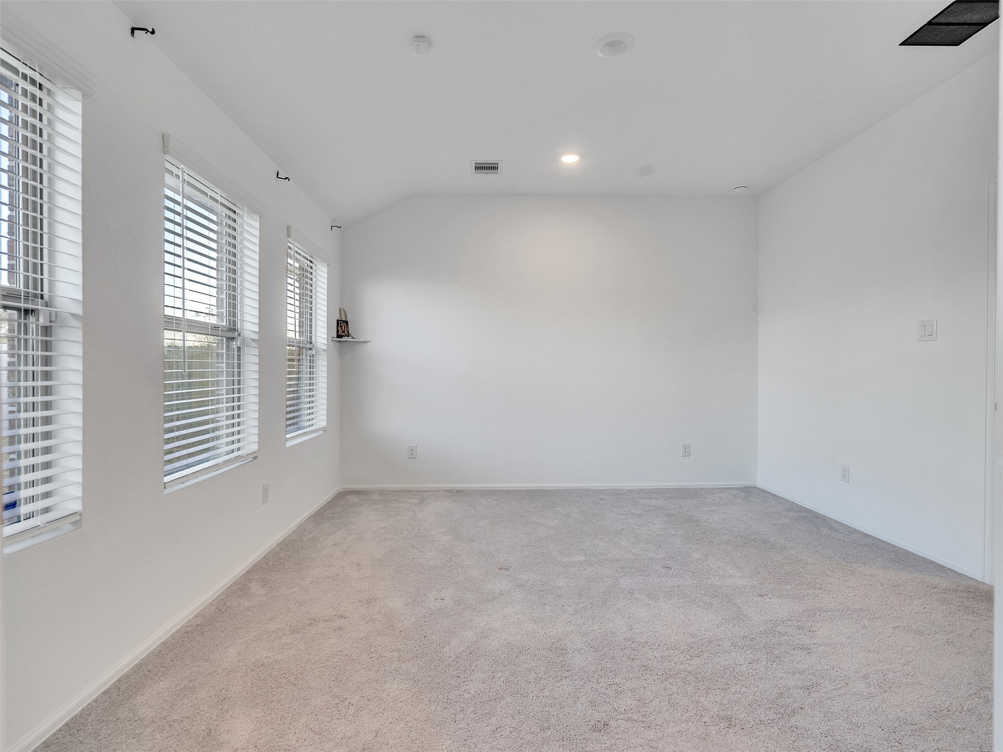 3019 Live Spgs Way Rosenberg, TX 77471 - Photo 21 of 36 an empty room with windows