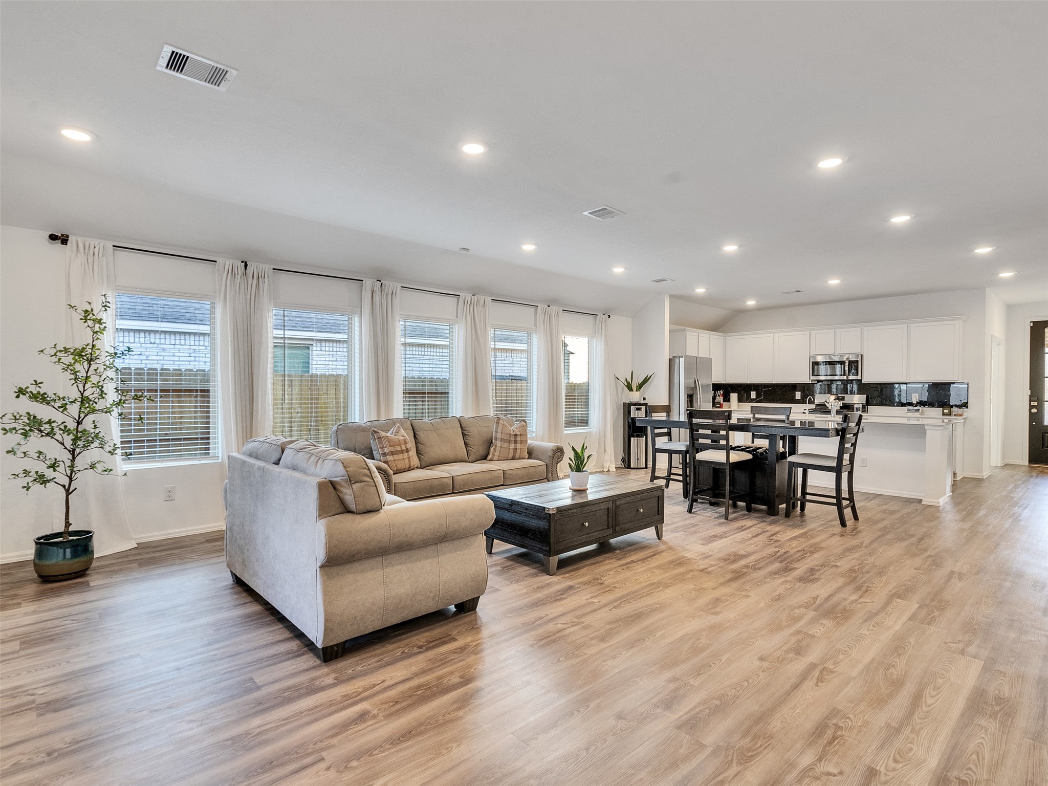 3019 Live Spgs Way Rosenberg, TX 77471 - Photo 26 of 36 a living room with furniture and a wooden floor