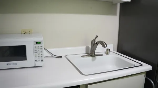 a close view of a sink in the kitchen
