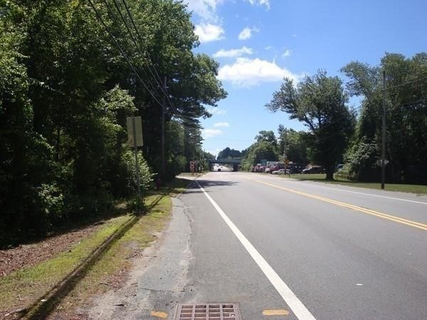 386 Wareham Street Middleboro, MA 02346 - Photo 6 of 15 a view of city street with a yard and a trees