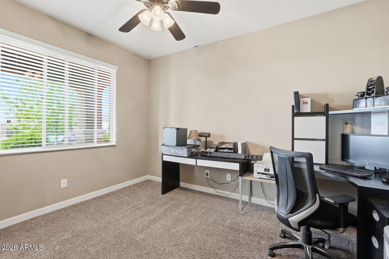 23602 West Ripple Road Buckeye, AZ 85326 - Photo 18 of 38 a workspace with furniture and window