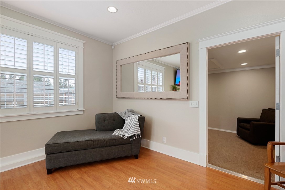 18 218th Place Southeast Bothell, WA 98021 - Photo 22 of 34 a living room with furniture and a window