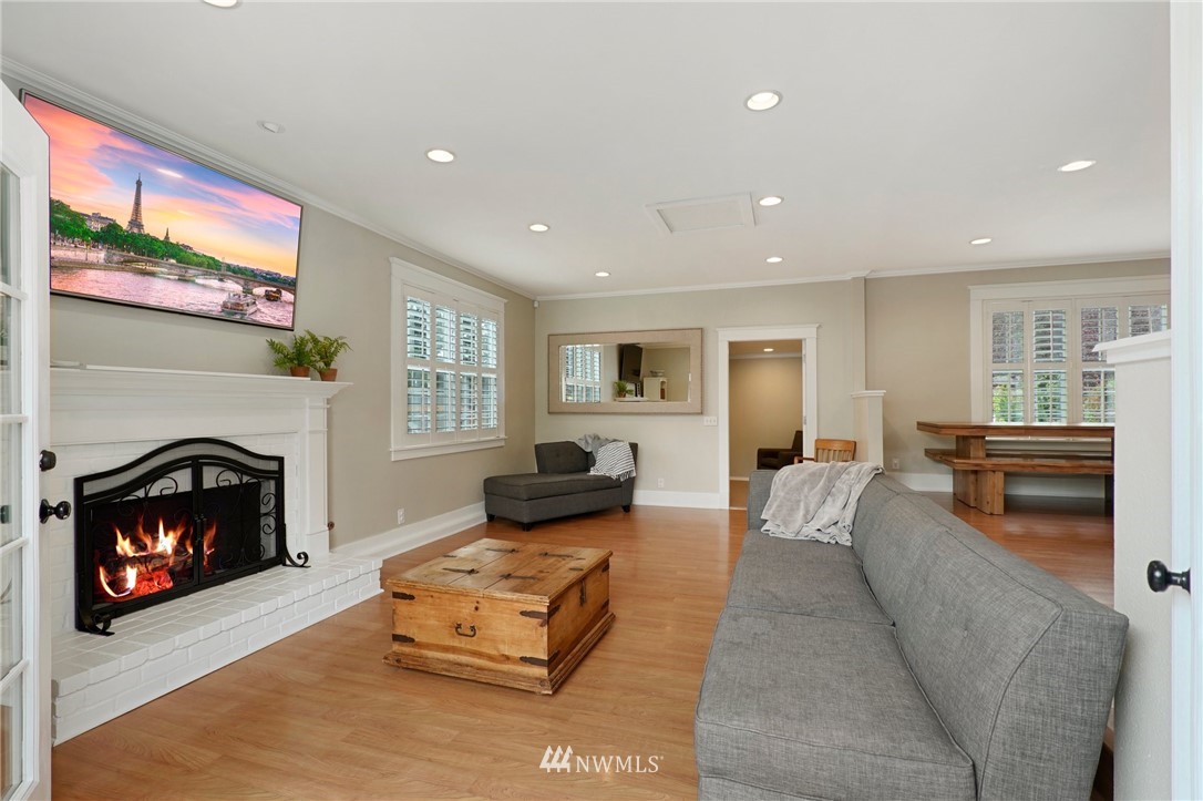 18 218th Place Southeast Bothell, WA 98021 - Photo 6 of 34 a living room with furniture and a fireplace