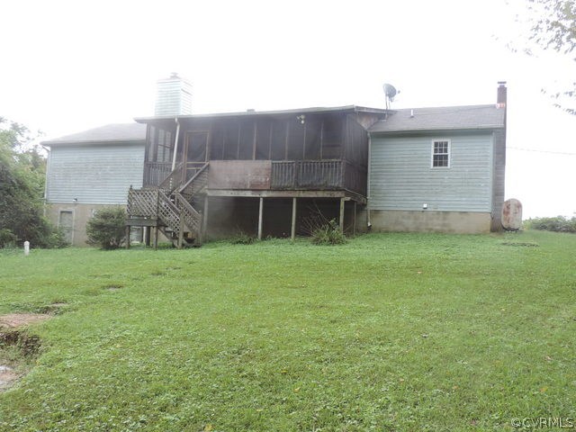 2299 Lockett Road Rice, VA 23966 - Photo 2 of 25 a backyard of a house with table and chairs