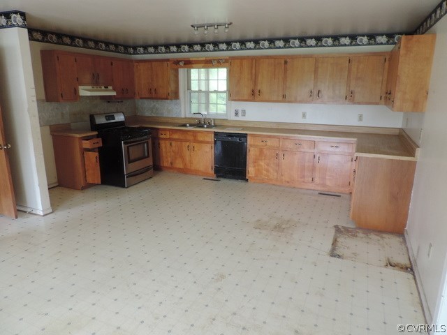 2299 Lockett Road Rice, VA 23966 - Photo 8 of 25 a kitchen with cabinets a sink and a stove