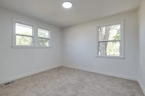 an empty room with a window