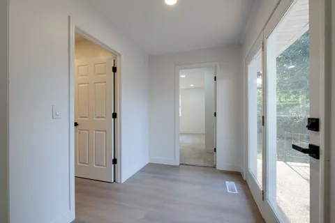 a view of a big room with closet and cabinet