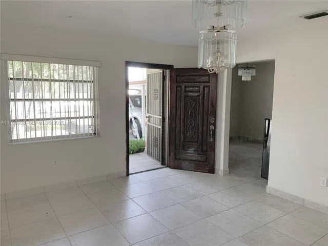 a view of entryway with a front door