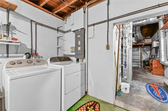 a utility room with dryer and washer