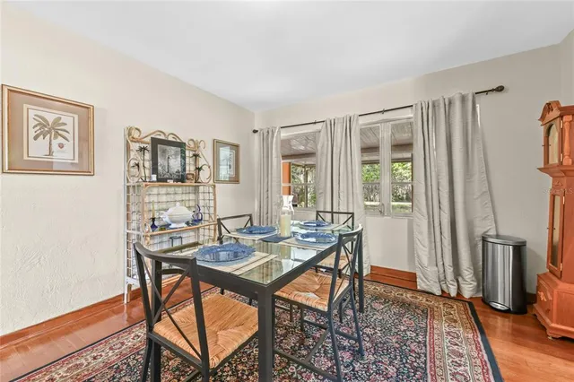 a view of a livingroom with furniture and a window