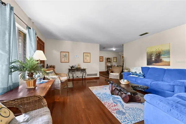 a living room with furniture or couch and a window