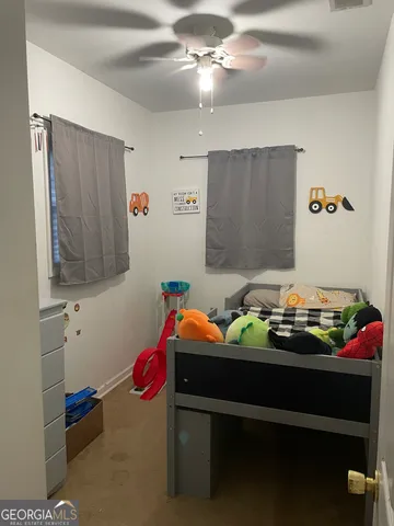 a room with furniture and chandelier