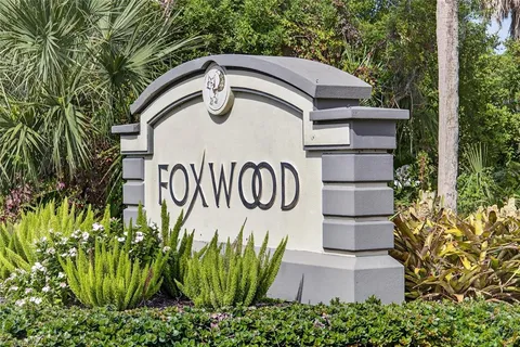 a view of entrance gate of a house