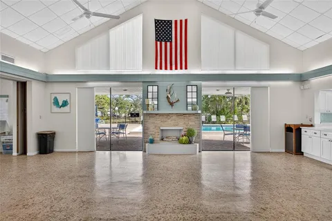 a hallway with a couch and a stove