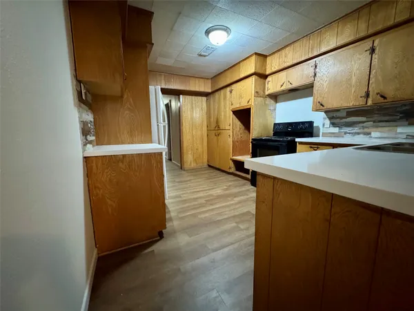 a view of a kitchen from the kitchen